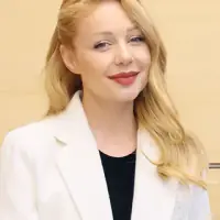 TINA KAROL